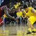 Michigan sophomore Trey Burke moves the ball around Indiana junior Vitcor Oladipo during the second half at Crisler Center on Sunday, March 10, 2013. Melanie Maxwell I AnnArbor.com